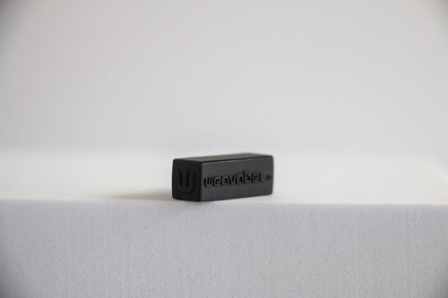 Weavabel black mouleded rubberised cord end